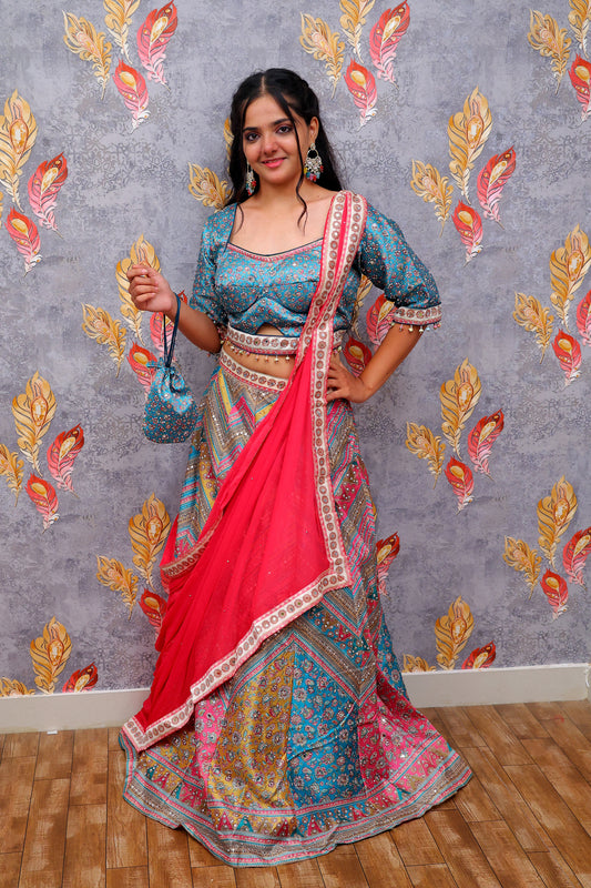 floral top Lehanga with embellishments and a color palette of blue, pink, and gold