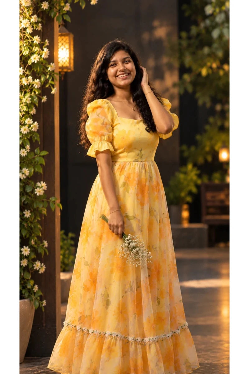 Yellow & Orange Floral Organza Long Frock with Puff Sleeves and Lace Tier for Women - Aira Fabrics Designer Studio